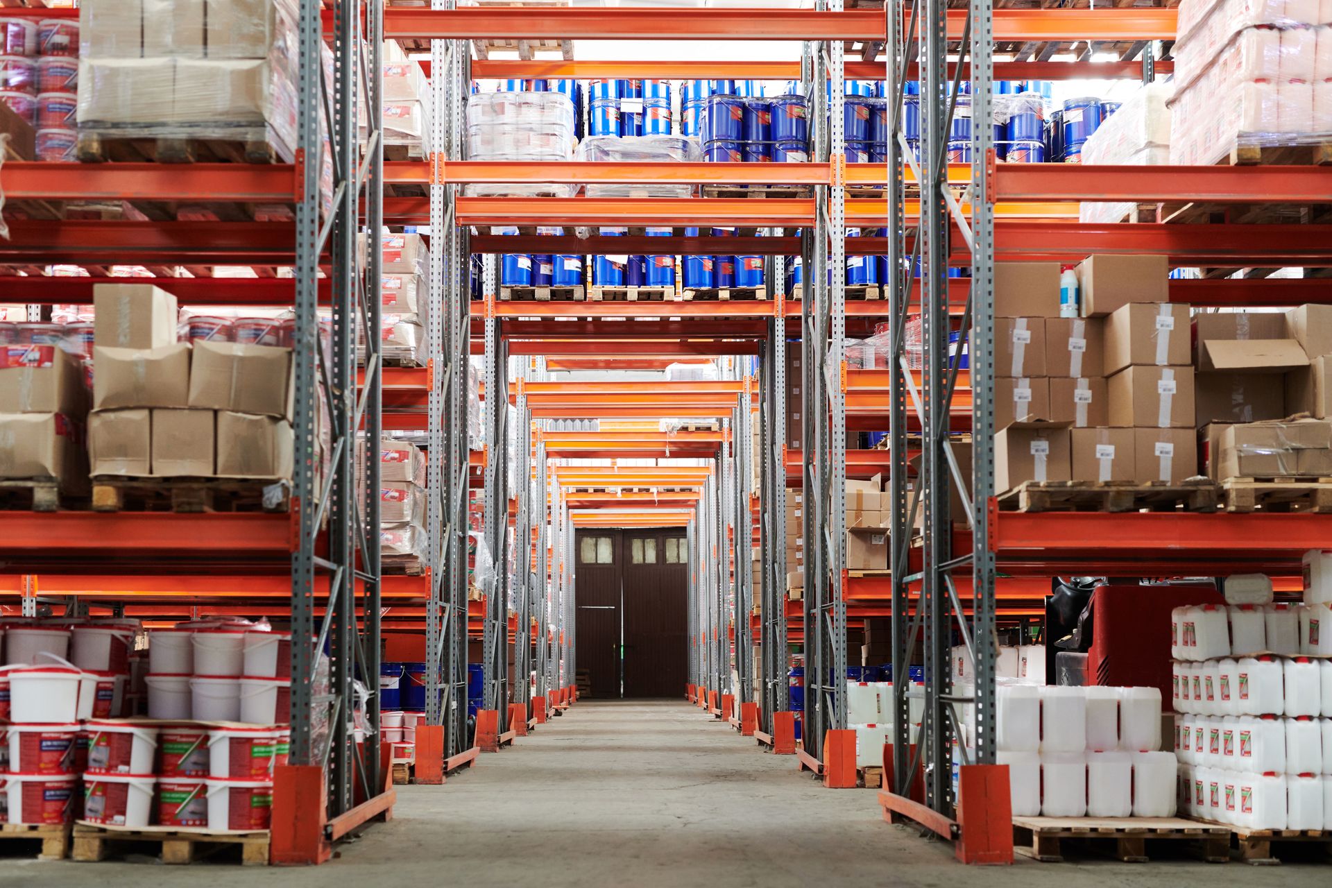Modern warehouse aisle with organized pallet racking